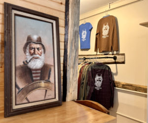 A portrait of an old sea captain leans against the wall in Panacea, at 100 Main St. in Wiscasset, on Thursday, Jan. 16. The portrait served as inspiration for the restaurants logo, which is printed on upcycled merchandise. (Johnathan Riley photo)