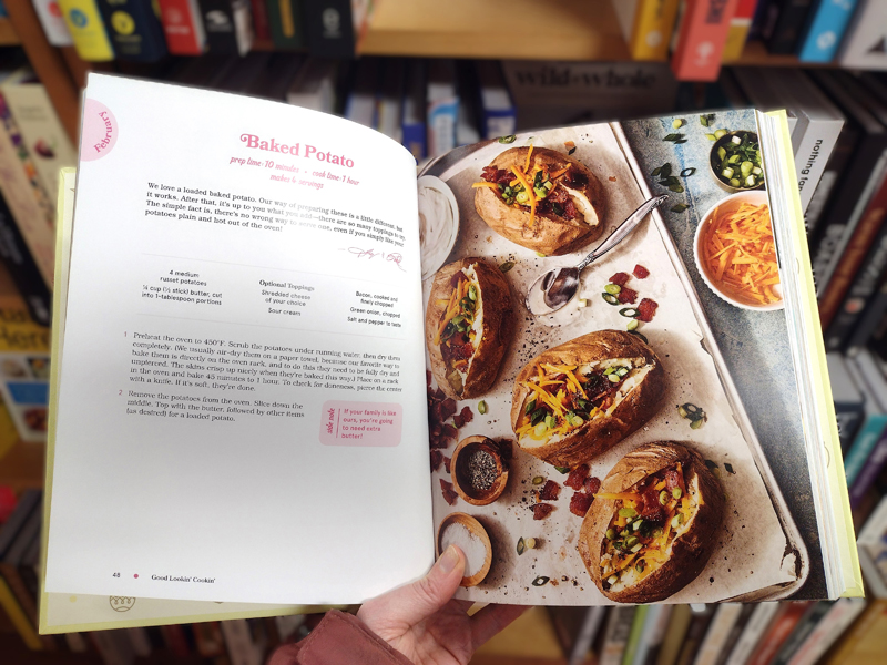 Browsing a copy of Good Lookin Cookin at Shermans Maine Coast Book Shop. (Photo courtesy Healthy Lincoln County)