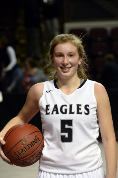 Brie Wajer with the game ball after scoring her 1,000th point for Lincoln Academy during a playoff game her senior year in 2017. Wajer is now an assistant coach and Director of Player Development for the women's basketball team at Army West Point, a NCAA Division I program. (LCN file photo by Paula Roberts)