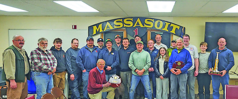 Members of the Massasoit Engine Co. in Damariscotta are joined by a couple of family members to gather for a photo after the company's annual meeting Tuesday, Jan. 14. During the meeting, members celebrated former Fire Chief William Brewer, Capt. Steve O'Bryan, and Assistant Chief Jon Pinkham for their lengthy service records. Brewer was elected to his 25th consecutive year as company treasurer, O'Bryan was elected to his 27th consecutive year as company clerk, and Pinkham was elected to his 25th year as a chief officer. (Courtesy photo)