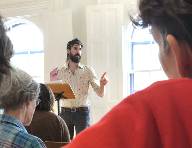 Michael Amico delivers a talk on local educational pioneer Harriett Haskell at the former Waldoboro Custom House in Waldoboro on June 29. The building is now home to Amico's nonprofit, Open House of History, through which he hopes to bring the past and present into conversation and unite locals over shared emotionality. (Sarah Masters photo)