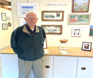 Tom Raymond stands near one of his pieces. (Courtesy photo)