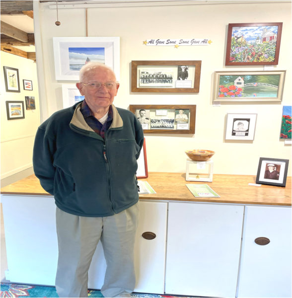 Tom Raymond stands near one of his pieces. (Courtesy photo)
