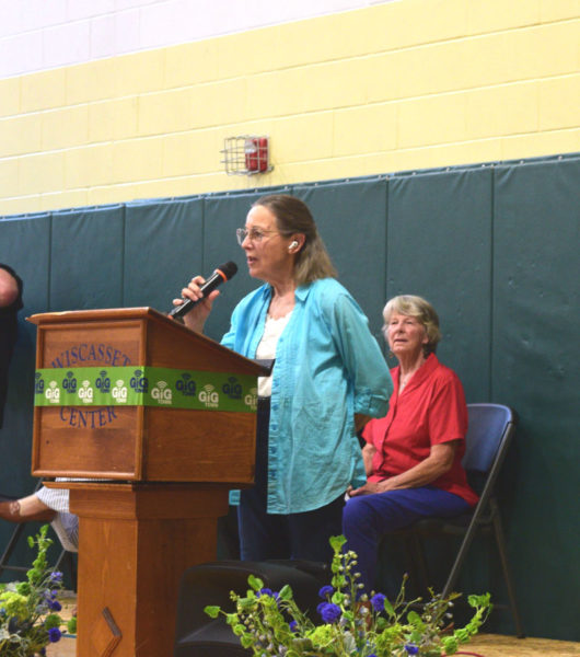 Janet Blevins, of the Edgecomb Website Committee, speaks about Lincoln County's accomplishment of having fiber-optic internet available in all of its towns at the Wiscasset Community Center on Thursday, Aug. 14. Edgecomb was one of 11 towns outfitted with a fiber network through Fidium Fiber. (Ali Juell photo)
