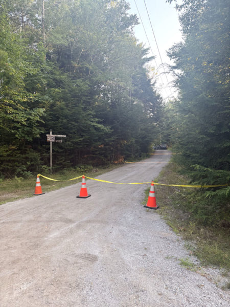 Police tape and traffic cones blocking the driveway as Maine State Police investigators examine a Genthner Road residence in Waldoboro on Saturday, Aug. 9. Levern Kelley, 53, was discovered deceased earlier that morning. Following an autopsy Sunday, Aug. 10, the Office of Chief Medical Examiner determined Kelley died as a result of a homicide. (Christina Wallace photo)
