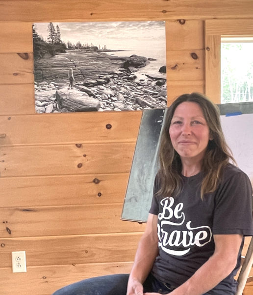 Jen Casad sits in a small artist studio on her property behind her home in Pemaquid. Casad shares her home with her husband and daughter, two horses, two cats, one bunny, and 20 chickens. In the winter when shellfish harvesting slows down, she focuses on her art and homeschooling her daughter, Elizabeth. (Sherwood Olin photo)