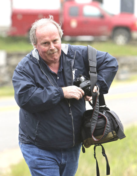 Longtime Boothbay Register Editor Kevin Burnham likes to get out and cover local sports events when the occasion arises. Sports and writing have been two lifelong interests for the Boothbay Harbor native. (Photo courtesy Robert Mitchell, Boothbay Register)