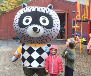 Luna Prock and August Cronkhite pose with PBS Kids character Carl the Collector at Coastal Kids Preschool's sensory-friendly event on Monday, Oct. 13 in Damariscotta. Carl the Collector, the namesake of a PBS Kids show, is the networks first main character with autism. (Christina Wallace photo)