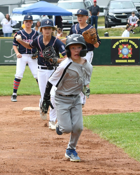 "Outnumbered," by Mic LeBel, received first place honors for sports photography in the Maine Press Association's Better Newspaper Contest.