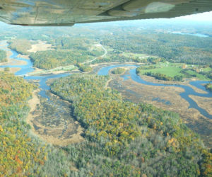 The full 200-plus acre Sherman Marsh can be seen in this aerial photo from 2008. In the weeks that followed the October 2005 storm that washed away Sherman Lake, locals debated the pros and cons of reestablishing the man-made lake. In late January 2006, the Maine Department of Transportation announced the state would not rebuild the dam, allowing the marsh to return to its natural state. (Courtesy photo) condition