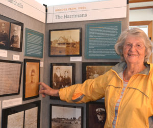 Trudy Harriman Metzger points to a photo of her mother, Beatrice Smith Harriman, included in the Brooks Cove exhibit at the Westport Island History Center. Located at the Wright Landing, the exhibit continues until spring 2026. (Charlotte Boynton photo)