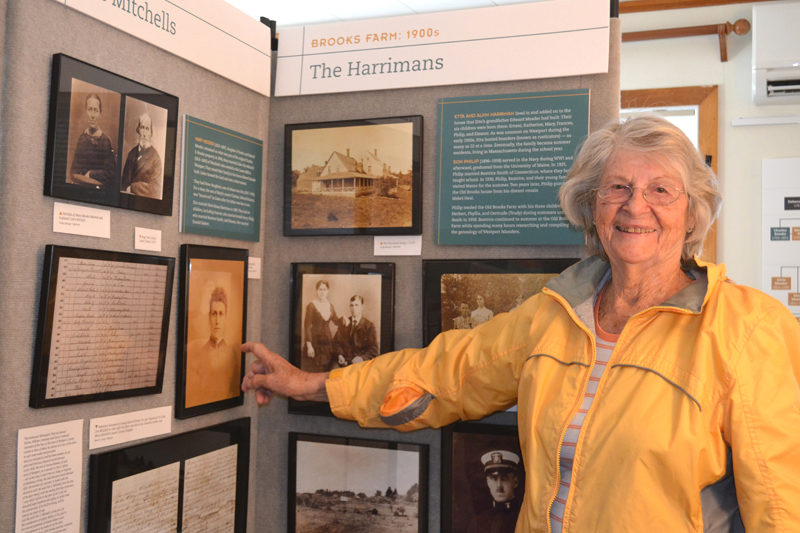 Trudy Harriman Metzger points to a photo of her mother, Beatrice Smith Harriman, included in the Brooks Cove exhibit at the Westport Island History Center. Located at the Wright Landing, the exhibit continues until spring 2026. (Charlotte Boynton photo)