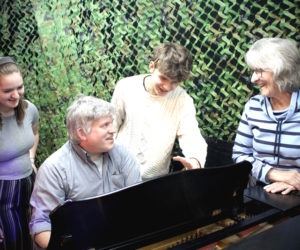 Lincoln Academy students Katelyn Prior and Nathaniel Hufnagel rehearse with accompanist Sean Fleming and vocal director Beth Preston for Stephen Sondheim's delightful musical, "Into the Woods," which opens at Poe Theater on Friday, Oct. 24. From left: Katelyn Prior, Sean Fleming, Nathaniel Hufnagel, and Beth Preston. (Photo courtesy Heartwood Regional Theater Co.)