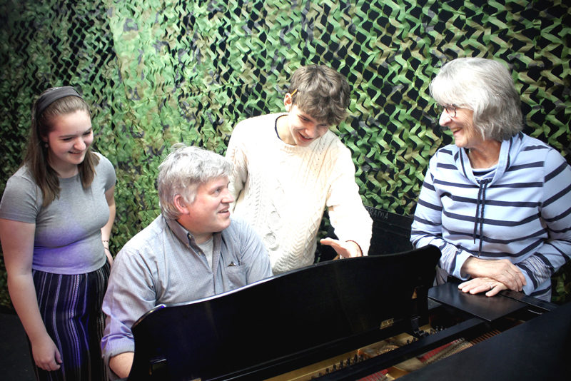 Lincoln Academy students Katelyn Prior and Nathaniel Hufnagel rehearse with accompanist Sean Fleming and vocal director Beth Preston for Stephen Sondheim's delightful musical, "Into the Woods," which opens at Poe Theater on Friday, Oct. 24. From left: Katelyn Prior, Sean Fleming, Nathaniel Hufnagel, and Beth Preston. (Photo courtesy Heartwood Regional Theater Co.)
