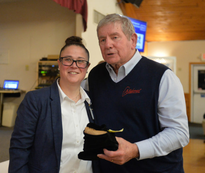 Katie Sibley receives her Midcoast Sport Hall of Fame award from Tom Mellor. (Paula Roberts photo)