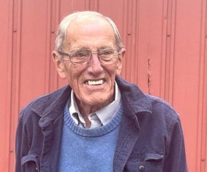 Firefighter, businessman, and quiet community servant, William "Bill" Brewer is all smiles after an interview in Newcastle. (Sherwood Olin photo)