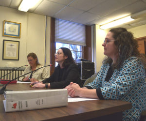 County Administrator Carrie Kipfer (left), District Attorney Natasha Irving (center), and Finance Director Michelle Richardson sit before the county commissioners during their Tuesday, Oct. 4 meeting. Following a $1 recommendation for the district attorney's office by the Lincoln County Budget Advisory Committee, Irving said straying from her office's $519,777 request would hurt her staff members. (Ali Juell photo)
