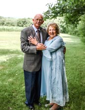 Newlyweds Paul Mosely and Maria Martin pose for a wedding photo outside their North Waldoboro home on July 13, 2024. (Photo courtesy Paul Mosely)