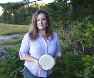 Allison Lakin, of Lakins Gorges Cheese, holds Opus 42, which received a silver award at the World Cheese Awards on Thursday, Nov. 13. (Photo courtesy Allison Lakin)