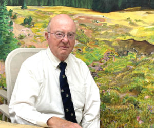 Damariscotta attorney Jim Gallagher sits in a conference room in his Main Street law office. Officially retired after a near 50-career, Gallagher still works one or two days a week as needed for a few remaining long-term clients. (Sherwood Olin photo)