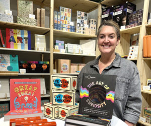 Hallie Robinson stands among the inventory of Midcoast Creative Studio, a creative gifts and curious goods store she and her husband cofounded at 72 Main St. in Wiscasset. Robinson said she hopes the store will help people of all ages discover ways to express themselves creatively. (Courtesy photo)