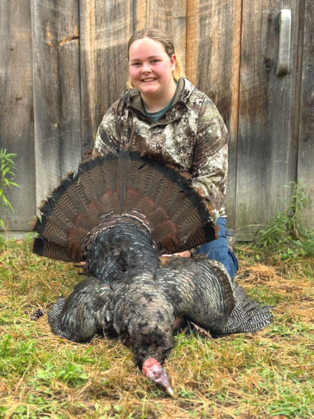 Helen Rice poses with the 17- to 18-pound tom turkey shot she shot on Oct. 13 in her quest of a big game grand slam. (Courtesy photo)