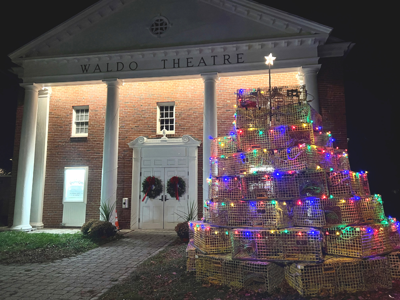 The brainchild of The Waldo Theatre board member Barbara Boardman, the newly installed lobster trap tree shines in front of the Waldoboro landmark. (Photo courtesy The Waldo Theatre)