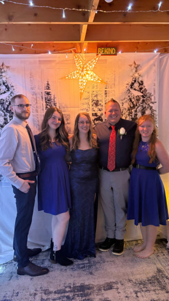 Jean (Reed) Adkins and Kevin Adkins celebrate their wedding with their family. From left: Christian Nielsen, Abby Reed, Jean Adkins, Kevin Adkins, and Shannon Adkins. (Courtesy photo)