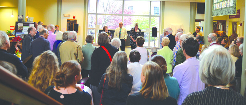 More than 200 well-wishers turn out to celebrate outgoing Executive Director Pam Gormley at a reception in her honor at Skidompha Public Library on May 19, 2019. Gormley died on Wednesday, Jan. 7 after a period of declining health. On stage, from left: Skidompha Library Board of Trustees President Karen Filler, past President Bill Bausch, and Pam Gormley. (LCN file)
