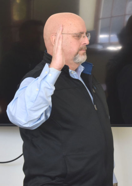 Erik Josephson takes the oath of office as Damariscotta's police chief in the town office on Tuesday, Jan. 27. Josephson, who has over 30 years of law enforcement experience, said he hopes to provide a stronger connection between the police department and the community. (Christina Wallace photo)