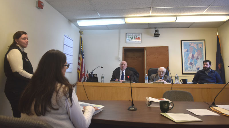 Emily Huber, director of the Lincoln County Emergency Management Agency, and Emily Rabbe, executive director of the Lincoln County Regional Planning Commision, present the updated hazard mitigation plan to the Lincoln County Board of Commissioners on Tuesday, Jan. 6. From left: Emily Huber, Emily Rabbe, and Lincoln County Commissioners David Levesque, William Blodgett, and Evan Goodkowsky. (Claire Taylor photo)