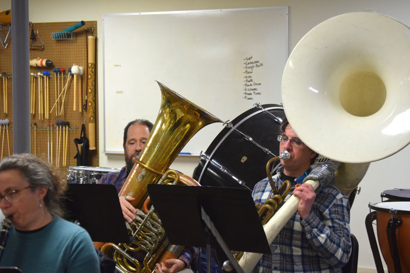 Mark Phillips (left) and Darius Jonason rehearse during the first Shuck Town Pep Band practice on Tuesday, Jan. 6. The band, formed out of the desire to bring live music to the community at Lincoln Academy basketball games, is open to members of the public. (Christina Wallace photo)
