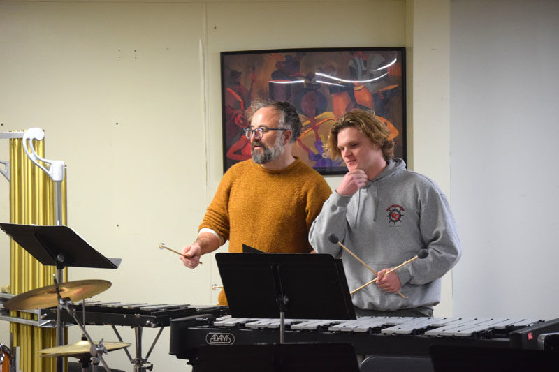Jonathan Scott (left) and Lincoln Academy student Oliver Jonason warm up on the xylophone during the first Shuck Town Pep Band rehearsal on Tuesday, Jan. 6. The Shuck Town Pep Band, made up of members of the community, students, and teachers, hopes to play at several of Lincoln Academys basketball games. (Christina Wallace photo)