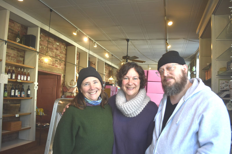 Stacy Linehan (left), former owner of Treats in Wiscasset, poses with new owners Emily Hughes and Joseph Swifka on Thursday, Jan. 8. Linehan said she hoped the sale would be an opportunity for the community to embrace change and be open to a new, fresh growth in this business." (Claire Taylor photo)