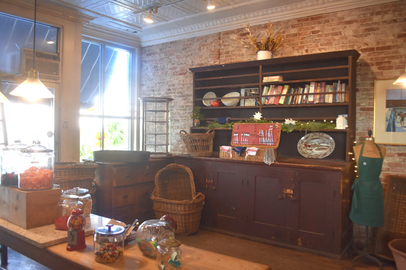 Antiques line the walls of Treats in Wiscasset before to renovations by new owners Joseph Swifka and Emily Hughes on Thursday, Jan. 8. The couple plans to create an expanded dining area in the room off of the bakery, adding a bar and tables. (Claire Taylor photo)