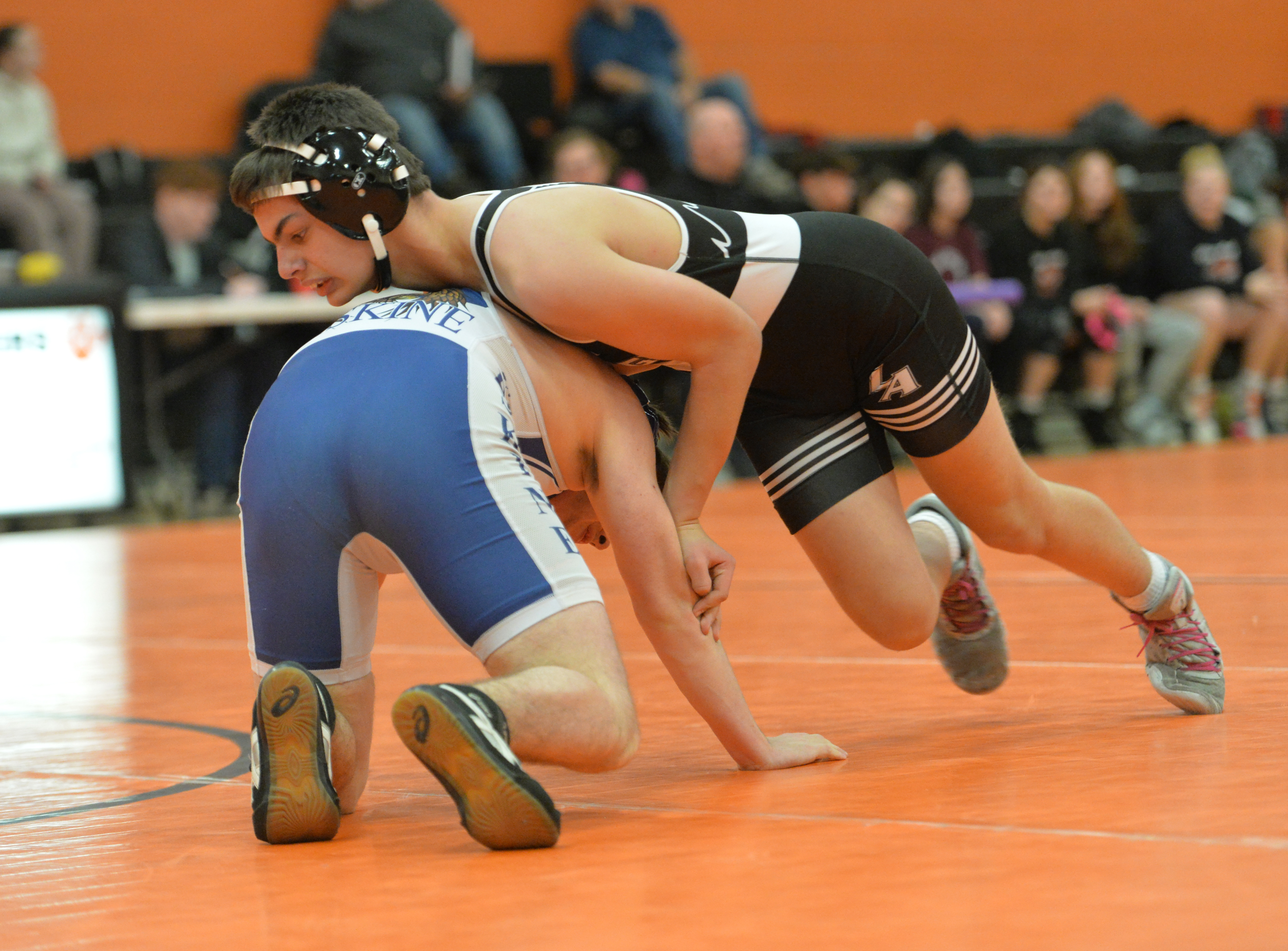 Shorthanded Eagle Wrestling Team Pins Down Individual Wins