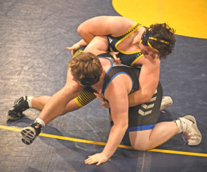 Medomak Valley senior Cole Bales pins Trevor Wilkinson of Mt. Ararat to earn the 100th win of his high school wrestling career on senior night, Thursday, Jan. 8 in Waldoboro. (Mic LeBel photo)