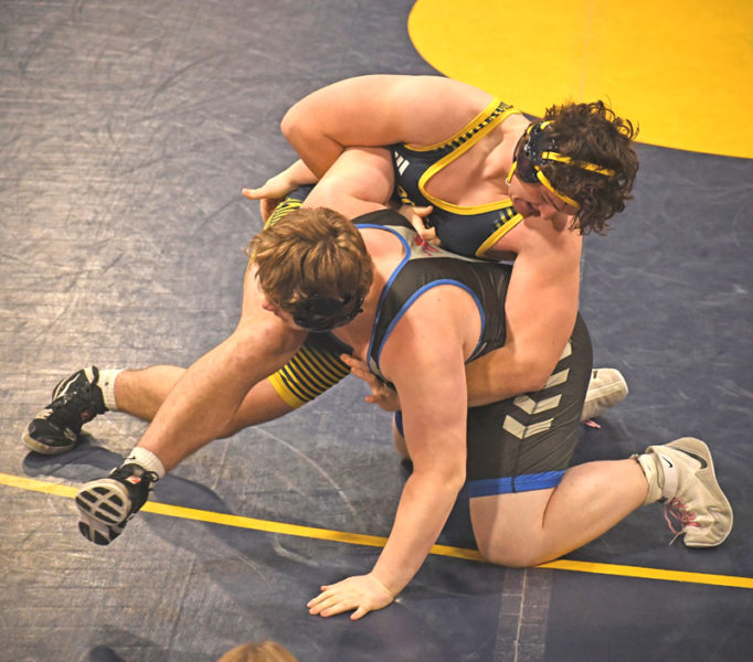 Medomak Valley senior Cole Bales pins Trevor Wilkinson of Mt. Ararat to earn the 100th win of his high school wrestling career on senior night, Thursday, Jan. 8 in Waldoboro. (Mic LeBel photo)