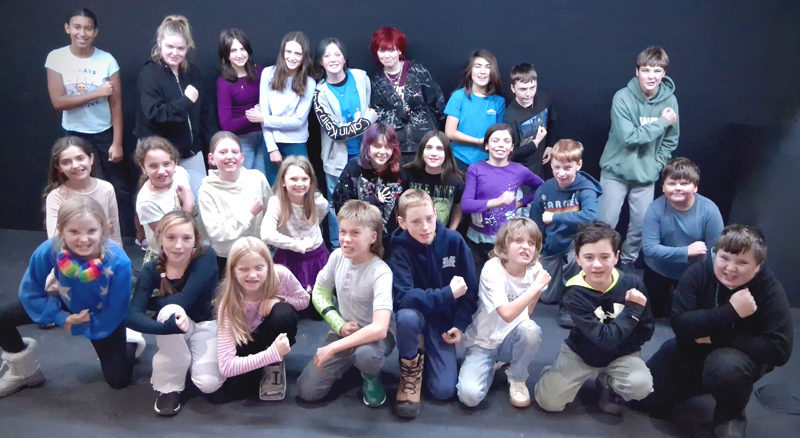 The cast of "Treasure Island" gives a rousing, "Aye, matey" during a rehearsal.  Public performances will take place in Poe Theater at Lincoln Academy on Friday, Jan. 30 and Saturday, Jan. 31. (Photo courtesy Heartwood Theater)