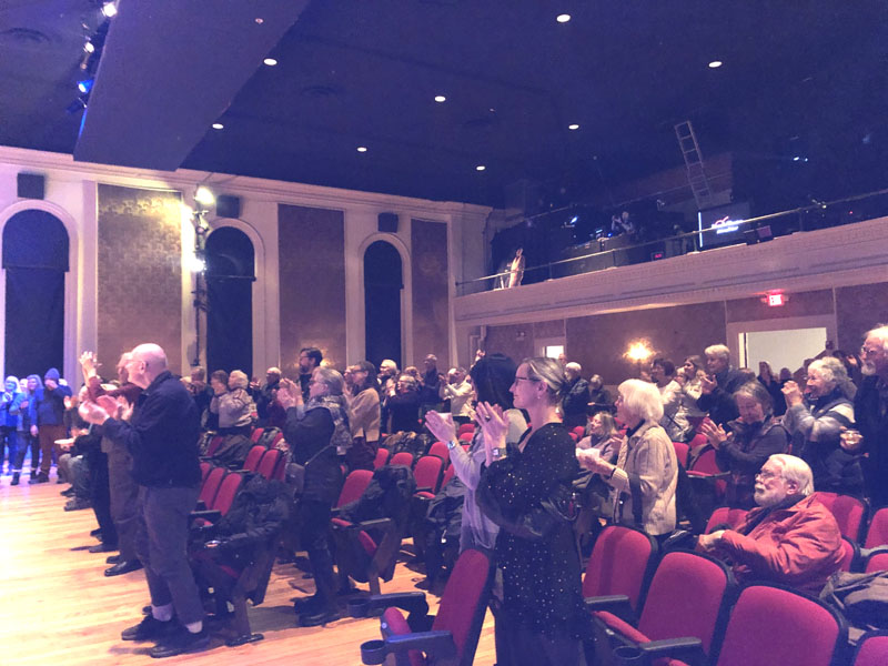 A standing ovation honors Lincoln Theaters former Executive Director Andrew Fenniman with during the dedication of the newly renovated Fenniman Lobby at the theaters 150th anniversary celebration in Damariscotta on Monday, Feb. 2. (Sarah Masters photo)