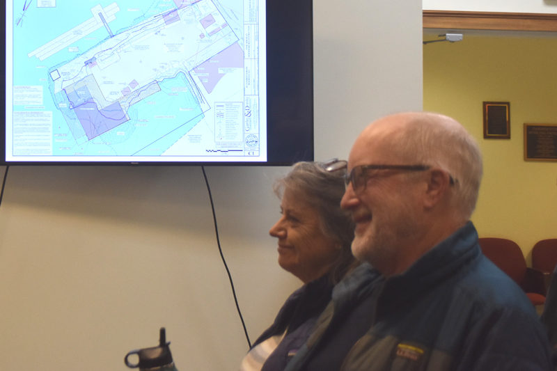 Schooner Landing owner Scott Folsom and his wife, Katie, smile during the Damariscotta Planning Board's Feb. 2 review of their permit to construct a new building to house the restauraunt. The new building will be further over than the prior structure for an expanded view, which customers have loved in the current set up, Folsom said. (Claire Taylor photo)
