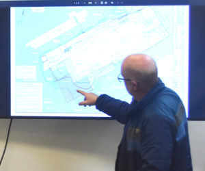 Schooner Landing owner Scott Folsom points to the site plan for the restaurant's new building, which the Damariscotta Planning Board approved in their meeting on Monday, Feb. 2. Folsom said he plans to make the new building resemble a rennovated fish house, "When you walk in, I want it to feel like its been there for 100 years he said. (Claire Taylor photo)