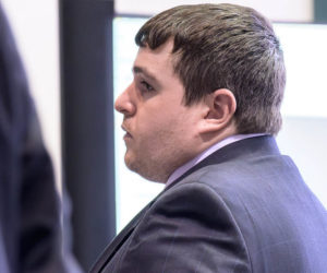 Tyler Witham-Jordan stands during a brief afternoon break at the Sagadahoc County Courthouse in Bath on Tuesday, Feb. 17. Witham-Jordan is accused of depraved indifference murder in the death of 3-year-old Makinzlee Handrahan. (Bisi Cameron Yee photo)