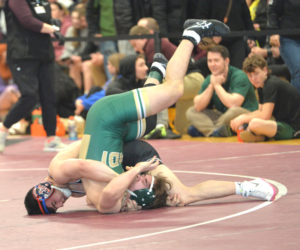 Lincoln Academy wrestler Jakobi Hagar pins Svante Anastasia, of MDI. Hagar won his third Class B wrestling state championship on Saturday, Feb. 14 at Mattanawcook Academy in Lincoln. (Paula Roberts photo)
