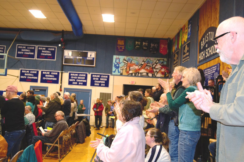 Moderator Don Means received a standing ovation after the Bristol select board recognized him for 35 years of service. After the towns annual meeting on Tuesday, March 17, the school committee is tasked with reevaluating the education budget after voters turned it down. (Emily Bracher photo).