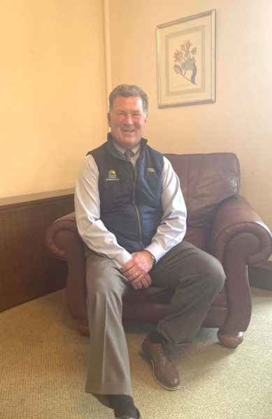 Mike Hall poses in the foyer of Hall Funeral Home, at 949 Main St/ in Waldoboro. Hall purchased the business from his father Richard Hall in 1992. The Hall family will observe 70 years in business in 2028. (Sherwood Olin photo)