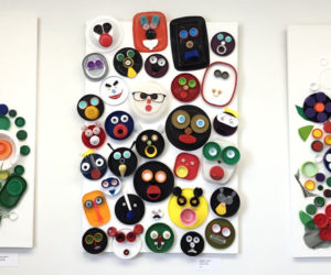 Plastic faces smile and plastic flowers bloom in Heather Greenes series of multimedia assemblages commentating on the prevalence of single-use, permanent plastics. Greenes work is featured in the March show in River Arts' River Room in Damariscotta. (Sarah Masters photo)