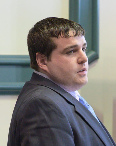 Tyler Witham-Jordan stands at the defendants table at the Sagadahoc County Superior Court in Bath on Feb. 26. Witham-Jordan was found guilty for depraved indifference murder on Tuesday, March 3 and awaits sentencing. (Bisi Cameron Yee photo)