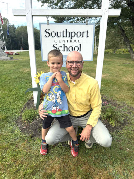 Shawn Gallagher poses with his son Arthur, 5, on the first day of school in September 2025. Arthur is enrolled in kindergarten at the Southport Central School where his father is the principal. (Courtesy photo)