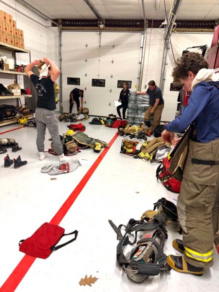 Students of the Lincoln County Fire Academys basic fire class try on fire gear on Monday, March 2. The class provides instruction in essential firefighting techniques, including ladder use, hose operations, nozzle handling, and fire extinguisher application. (Courtesy photo)